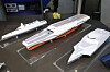 HD Hyundai Heavy Industries displays its next-generation naval vessels at the MADEX 2025 exhibition in Busan. From left: a future combat ship, a next-generation unmanned power carrier and a mobile unmanned power carrier. [HD HYUNDAI]