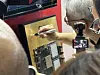 Nvidia CEO Jensen Huang signs an SK hynix Inc. HBM unit at Computex 2025 in Taipei on May 20, 2025. [YONHAP]