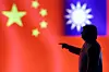 A 3D-printed miniature model depicting U.S. President Donald Trump, Chinese flag and fragment of Taiwanese flag in this illustration taken on April 17 [REUTERS/YONHAP]