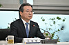 Kim Yong-beom, presidential director of national policy, speaks during a meeting in Gwangju on Dec. 17. [YONHAP]