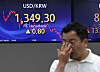 A screen in Hana Bank's trading room in central Seoul shows the local currency closing at 1,349.3 won against the dollar on Wednesday. [NEWS1]