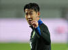 Son Heung-min gestures during the warm up before a match between Korea and Brazil at the Seoul World Cup Stadium in western Seoul on Oct. 10. [REUTERS/YONHAP]