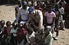 Britain's Prince Harry playfully teases a child during a safety class for children as part of his visit to see the work of landmine clearance charity of the Halo Trust, in Cuito Cuanavale, Cuando province, southern Angola, July 16. [AP/YONHAP]