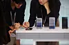 Samsung Electronics employees check the smartphone Galaxy S25 series at a Samsung store in Seoul on April 15. [REUTERS/YONHAP]