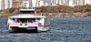A Hangang Bus ferry remains stuck near the Jamsil dock on Nov. 17 after striking the riverbed two days earlier. [YONHAP]
