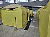 Tents at Muan International Airport are cleared on Sunday morning as families pack belongings to return to their hometowns for funerals. [JO SU-BIN]