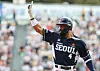 Henry Ramos celebrates after recording a hit for the Doosan Bears against the LG Twins at Jamsil Baseball Stadium in southern Seoul on Sunday. [NEWS1]