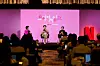 From left, host Park Kyeong-rim, ″Squid Game″ director Hwang Dong-hyuk and Siren Pictures CEO Kim Ji-yeon attend a press conference for the upcoming season held in Jongno District, central Seoul, on Aug. 1. [NETFLIX]