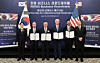 Participants pose for a commemorative photo during the small modular reactor (SMR) memorandum of understanding (MOU) signing ceremony held immediately following the Korea-U.S. Business Roundtable in Washington on Aug. 25. From left: Minister of Trade, Industry and Energy Kim Jung-kwan, Doosan Energy Chairman Park Gee-won, Korea Hydro & Nuclear Power President Whang Joo-ho, X-Energy CEO Clay Sell, AWS Energy Policy Manager Ray Fakhoury, and U.S. Secretary of Commerce Howard Lutnick. [DOOSAN ENERBILITY]
