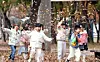 Children play among autumn leaves at a park in Buk District, Gwangju, on Nov. 21, 2024. [GWANGJU'S BUK DISTRICT OFFICE]