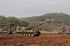 Troops are seen firing shells from K9A1 self-propelled howitzers on April 22, 2025. [KOREAN ARMY]