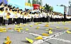 Yellow paper planes thrown by members of a choir land on the ground during a remembrance service for the victims of the Sewol ferry tragedy at Hwarang Public Garden in Ansan, Gyeonggi, on Tuesday, which marked the 10th anniversary of the tragedy. [JOINT PRESS CORPS]