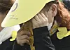 A bereaved family member of the Sewol ferry tragedy victim sheds tears during a remembrance service held in Ansan, Gyeonggi, on Tuesday. [JOINT PRESS CORPS]