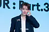 Ateez’s Hongjoong poses for photos during a news conference for the release of its 12th EP, “Golden Hour: Part.3,” at Hotel Naru Seoul MGallery Ambassador in western Seoul. [DANIELA GONZALEZ PEREZ]