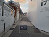 A signboard placed at an alleyway in Bukchon Hanok Village inform visitors of restricted hours. [JONGNO DISTRICT OFFICE]