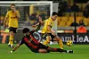 Wolverhampton Wanderers forward Hwang Hee-chan, right, vies for the ball during a Premier League match against Bournemouth at Molineux Stadium in Wolverhampton, England on Nov. 30. [REUTERS/YONHAP]