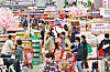 Customers shop for items at Lotte Mart's Seoul Station branch in Jung District, central Seoul, on March 27. [YONHAP]