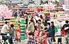 Customers shop for items at Lotte Mart's Seoul Station branch in Jung District, central Seoul, on March 27. [YONHAP]