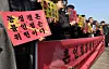 Members of same-sex marriage equality group Rainbow Action Korea and Minbyun Lawyers for a Democratic Society hold a press conference outside the Constitutional Court in Jongno District, central Seoul, on Feb. 14, to file a constitutional petition following a Seoul Northern District Court decision rejecting a request for a constitutional review on the nonrecognition of same-sex marriage. [YONHAP]