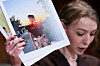 Kateryna Rashevska, a legal expert at the Regional Center for Human Rights, holds a picture she says depicts an abducted Ukrainian child who was sent to North Korea as she testifies before a U.S. Senate Appropriations subcommittee hearing on the abduction of Ukrainian children by Russia on Dec. 3. [REUTERS/YONHAP]