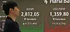 Kospi closes at 2,831.11 on June 5, the highest figure in 2025, a day after the inauguration of President Lee Jae-myung. In the picture is a worker at a Hana Bank branch in central Seoul. [NEWS1]