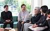 President Lee Jae-myung, second from left, speaks with famed scriptwriters of Korea in Jeonju, North Jeolla on May 7 where he discussed ways to foster domestic contents. [YONHAP]