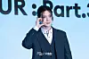 Ateez’s Yeosang poses for photos during a news conference for the release of its 12th EP, “Golden Hour: Part.3,” at Hotel Naru Seoul MGallery Ambassador in western Seoul. [DANIELA GONZALEZ PEREZ]