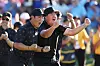 This file photo shows Tom Kim and Im Sung-jae react to a putt on the 18th green during day two of the 2022 Presidents Cup at Quail Hollow Country Club in Charlotte, North Carolina on Sept. 23, 2022. [GETTY IMAGES]
