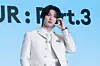 Ateez’s Mingi poses for photos during a news conference for the release of its 12th EP, “Golden Hour: Part.3,” at Hotel Naru Seoul MGallery Ambassador in western Seoul. [DANIELA GONZALEZ PEREZ]