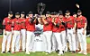 Kia Tigers pitchers celebrate with the KBO regular season trophy at Gwangju Kia Champions Field in Gwangju on Wednesday. [NEWS1]