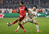 Bayer Leverkusen's Amine Adli, left, in action with Bayern Munich's Kim Min-jae during round 16 of the Champions League in Munich, Germany, on March 5. [REUTERS/YONHAP]