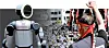 From left: The Atlas humanoid robot; Members of the Hyundai Motor labor union stage a protest, calling for a wage increase, in Ulsan on Sept. 3, 2025. [REUTERS/YONHAP]