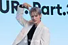 Ateez’s Wooyoung poses for photos during a news conference for the release of its 12th EP, “Golden Hour: Part.3,” at Hotel Naru Seoul MGallery Ambassador in western Seoul. [DANIELA GONZALEZ PEREZ]