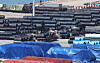 This file photo taken on Aug. 24, 2025, shows steel products piled up at a port in Pyeongtaek. [YONHAP]