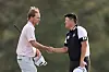 Im Sung-jae, right, shakes hands with Russell Henley on the 18th hole during the first round of The Masters at Augusta National Golf Club in Augusta, Georgia on April 10. [AFP/YONHAP]