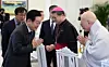 President Lee Jae Myung, left, greets Ven. Jinwoo, president of the Jogye Order of Korean Buddhism, right, during a luncheon with religious leaders at the Blue House in Seoul on Jan. 12. At the center is Archbishop Peter Chung Soon-taick of the Archdiocese of Seoul. The luncheon was attended by senior leaders from Buddhism, Catholicism, Protestant Christianity, Won Buddhism, Confucianism and Cheondoism. [YONHAP]