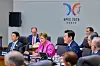 Korean President Lee Jae Myung, right, speaks during the first session of the APEC Economic Leaders' Meeting at the Gyeongju Hwabaek International Convention Center in Gyeongju, North Gyeongsang on Oct. 31. [JOINT PRESS CORPS]