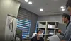 An investigator from the Busan Metropolitan Police Agency’s narcotics crime unit notifies a doctor at a hospital in Busan of a search and seizure warrant for allegedly overprescribing psychotropic appetite suppressants. [BUSAN METROPOLITAN POLICE AGENCY]