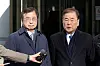 Former National Security Adviser Chung Eui-yong, right, and former National Intelligence Service (NIS) Director Suh Hoon speak to reporters after receiving suspended sentences at the Seoul Central District Court in Seocho District, southern Seoul, on Feb. 19. [YONHAP]