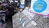 A sign promoting the use of consumer coupons is displayed at a dried seafood shop at Jungbu Market in Jung District, central Seoul, on Aug. 26. [NEWS1]