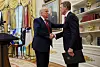 U.S. President Donald Trump shakes hands with former U.S. Senator David Perdue during Perdue's swearing-in ceremony to be the new U.S. ambassador to China, at the White House in Washington on May 7. [REUTERS/YONHAP]