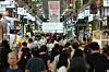A banner promoting the use of consumer coupons hangs at Mangwon Market in Mapo District, Seoul, on Aug. 26. [YONHAP]