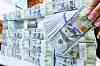 A stack of $100 bills at the Bank of Korea [NEWS1]