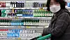 Bottles of soju are displayed at a supermarket in Seoul on Feb. 26, 2023. [YONHAP]