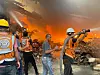 Firefighters work to extinguish a blaze in buildings in the Al-Zaytoun neighborhood of Gaza City following intense Israeli airstrikes on the city, in the Gaza Strip on Aug. 29. [UPI/YONHAP]