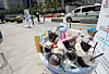 Plastic beverage cups piled up in public trash bins at Gwanghwamun Square in central Seoul, on May 20, 2019 [YONHAP]