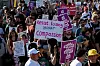 Hundreds of Jews and Arabs hold placards calling for the Israel-Hamas war to end and photos of starving children in Gaza at a protest in Habima Square in Tel Aviv on Aug. 23. [UPI/YONHAP]