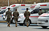 Soldiers walk near the emergency room of Armed Forces Hospital in Daejeon on Monday. The government dispatched 138 public health doctors and 20 military doctors to 20 general hospitals for four weeks from Monday to fill in for disrupted medical services. [KIM SEONG-TAE]