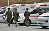 Soldiers walk near the emergency room of Armed Forces Hospital in Daejeon on Monday. The government dispatched 138 public health doctors and 20 military doctors to 20 general hospitals for four weeks from Monday to fill in for disrupted medical services. [KIM SEONG-TAE]