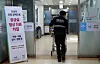 A paramedic enters an emergency room of a hospital in Yangsan, South Gyeongsang, on Monday. [NEWS1]